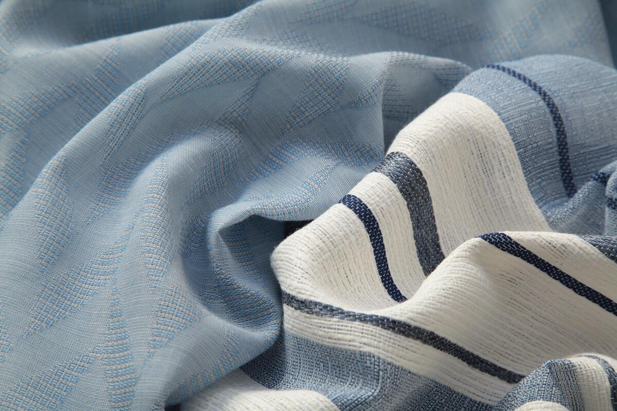 Drapery fabric from Pindler’s Exclusive Platinum indoor/outdoor collection, including Peniche in Chambray and Ibiza in Ink Drapery fabric from Pindler’s Exclusive Platinum indoor/outdoor collection, including Peniche in Chambray and Ibiza in Ink